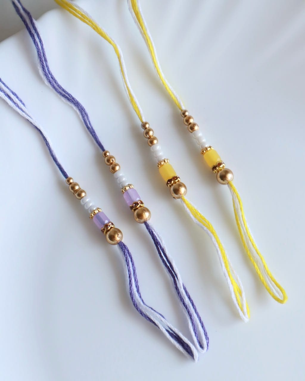 Soft Pastel Rakhi Threads with Crystal Beads