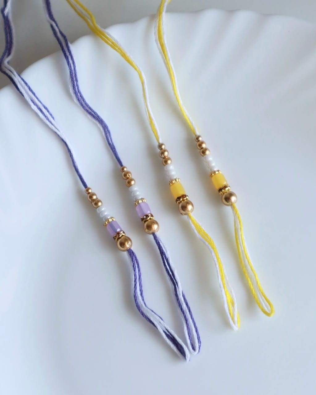Soft Pastel Rakhi Threads with Crystal Beads