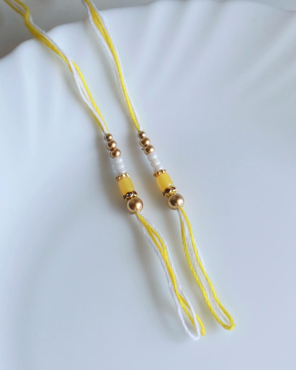 Soft Pastel Rakhi Threads with Crystal Beads